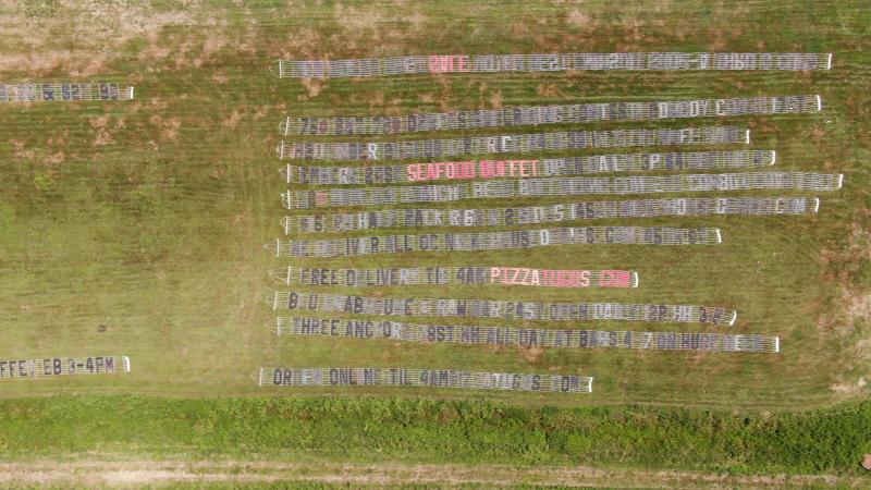 The day’s banners laid out ready to go. ROB WATERS PHOTO